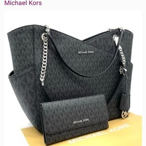Michael Kors black leather with silver chain accent